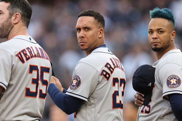Michael Brantley of the Houston Astros looking on as the National Anthem plays
