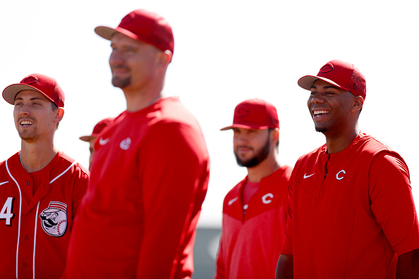 Members of the 2023 Cincinnati Reds pitching staff watching a spring training drill.