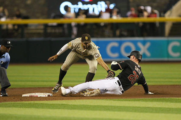 Pavin Smith of the Diamondbacks gets tagged out against the Padres. The Diamondbacks now face the Royals for three games.