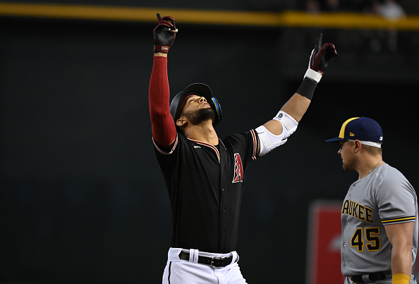 Diamondbacks Report Brewers Marlins Lourdes Gurriel Jr. pointing to the sky after a single against the Brewers.
