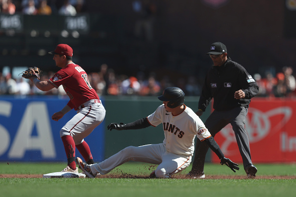 Wilmer Flores of the Giants sliding into second against the Diamondbacks. The Diamondbacks host the Giants after dropping two of three to the Marlins.