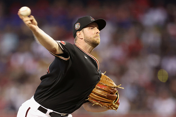 Merrill Kelly pitches during the 4–2 Diamondbacks victory over the Red Sox.