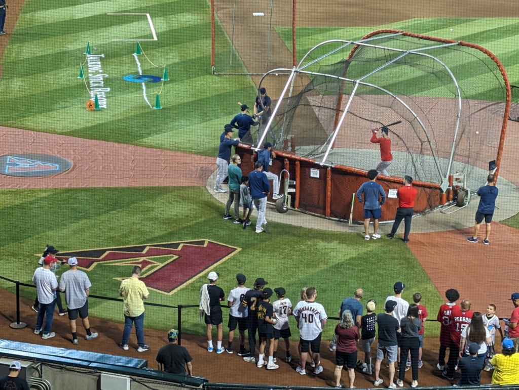 The Red Sox taking batting practice before their game with the Diamondbacks.