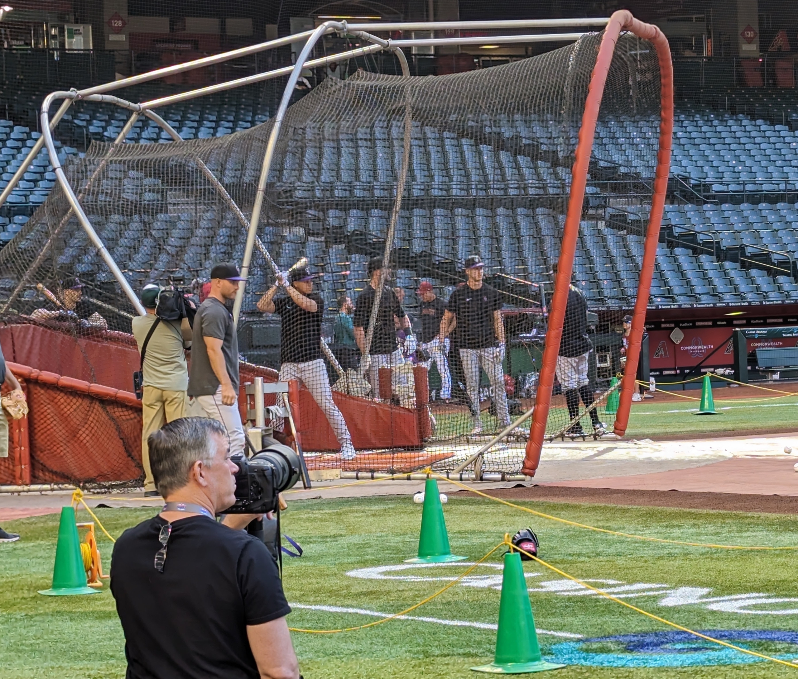 Members of the Colorado Rockies taking batting practice before their game against the Arizona Diamondbacks.