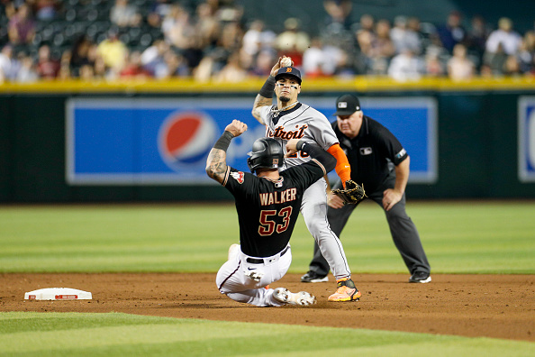 Christian Walker of the Diamondbacks sliding in against the Tigers. The Diamondbacks take on the Tigers in a three-game weekend series after snagging a pair from the Nationals.