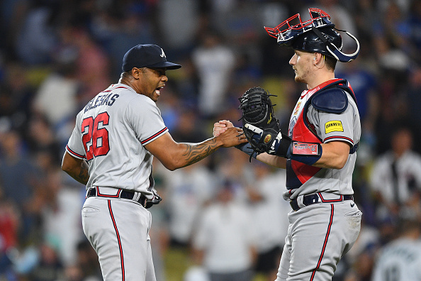Raisel Iglesias celebrating with Sean Murphy, whose Atlanta Braves are second in the NL and third overall in Week 22's bullpen/reliever/relief corps rankings
