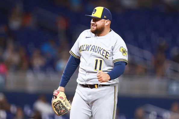 Position pitcher Rowdy Tellez celebrating a strike as he closed out a blowout win. His Milwaukee Brewers are first in the NL and first overall in Week 26's bullpen/reliever/relief corps rankings.