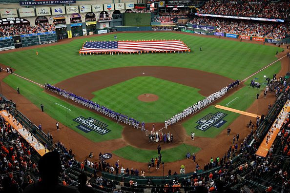 Astros and Rangers lined up for the National Anthem prior to Game 1 of the 2023 ALCS