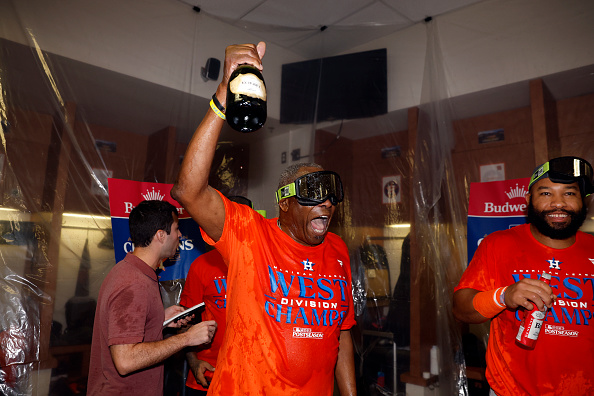 The Houston Astros celebrate their third consecutive AL West title after defeating the Arizona Diamondbacks, 8–1.