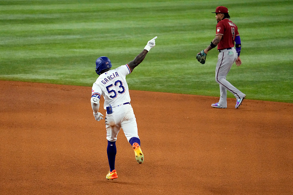 Adolis Garcia of the Texas Rangers running the bases after his walk-off homer in the bottom of the 11th defeated the Arizona Diamondbacks in Game One of the 2023 World Series.