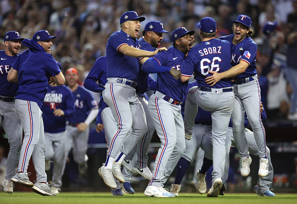 The Texas Rangers celebrating after winning the World Series over the Arizona Diamondbacks