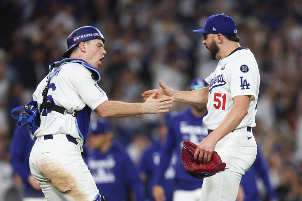 Alex Vesia and Will Smith celebrate the Dodgers winning Game Two of the 2024 World Series over the Yankees