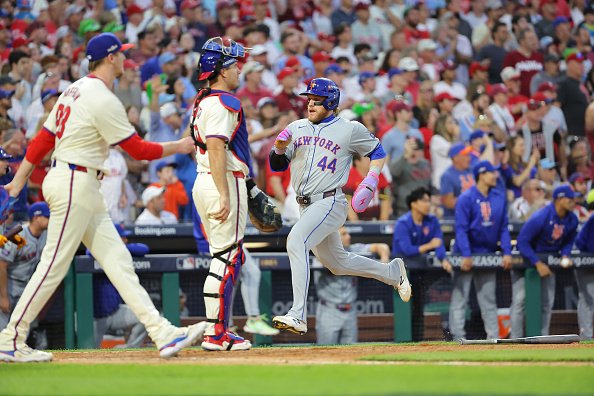 Harrison Bader of the Mets scoring against the Phillies in Game One of the 2024 NLDS