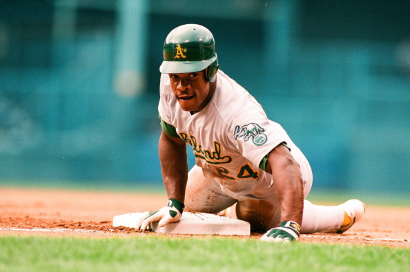 Rickey Henderson stealing third