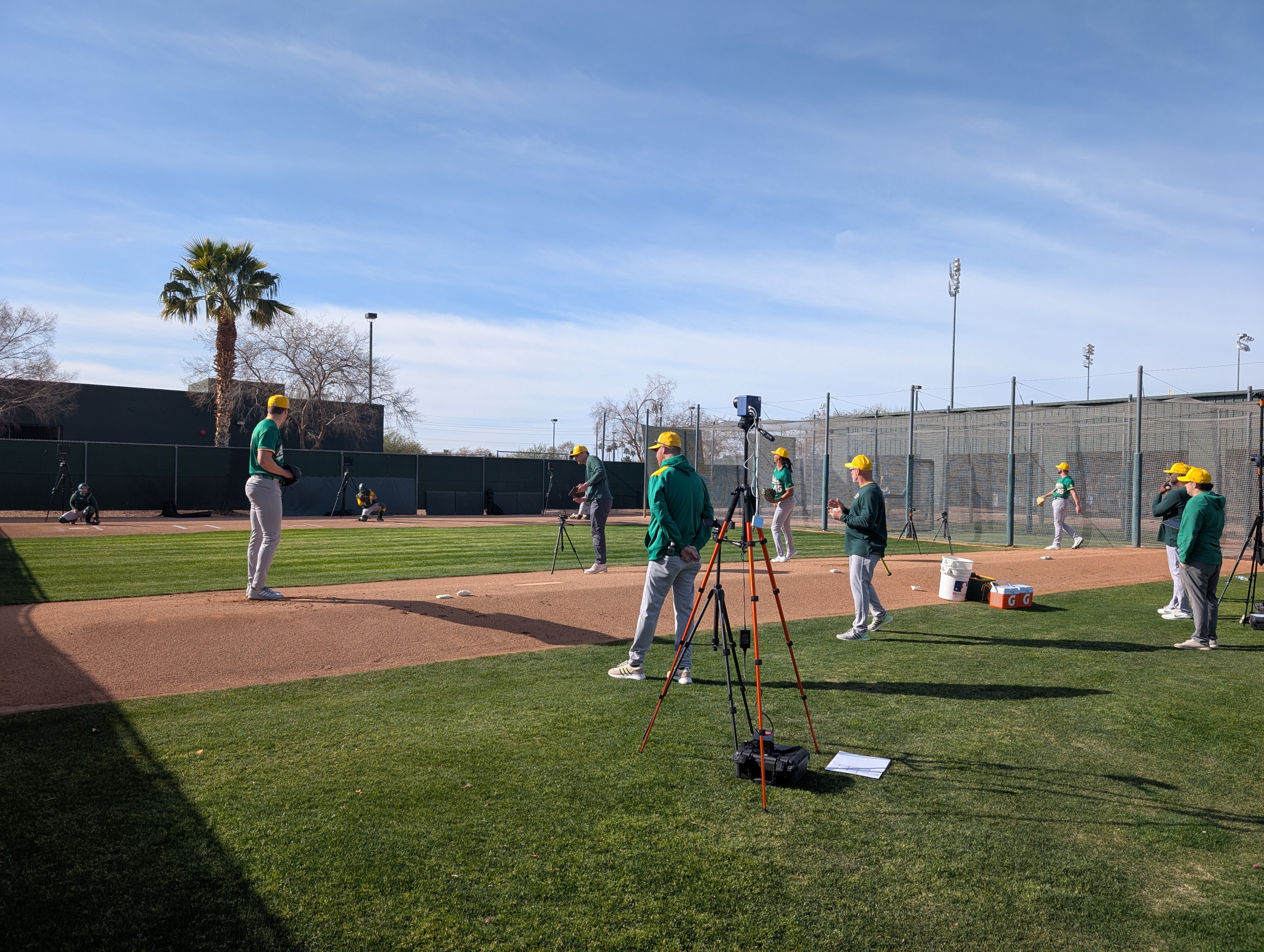 Members of the Athletics Pitching Staff taking bullpen sessions at spring training.