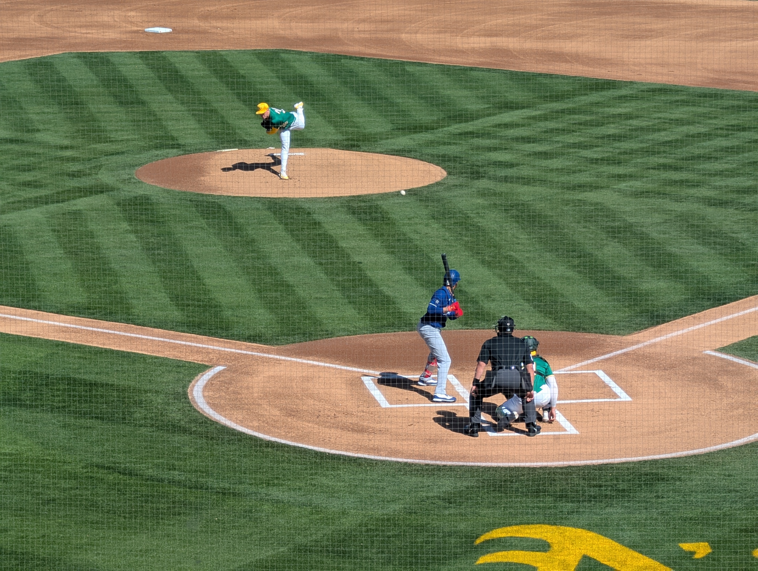 JP Sears of the Athletics pitching to Mookie Betts of the Dodgers