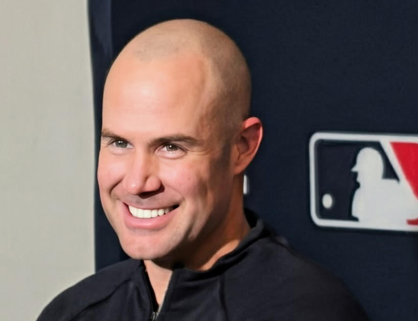 Skip Schumaker smiling at a question from a reporter