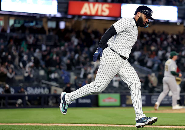 Amed Rosario of the Yankees celebrating a go-ahead homer against the Athletics