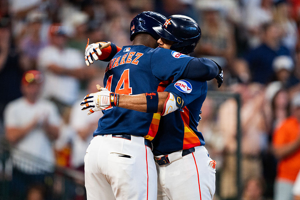 Jeremy Peña and Yordan Alvarez of the Astros following a Peña home run against the Rangers