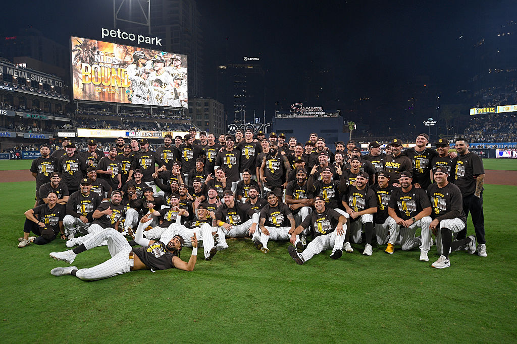 The Padres pose for a team photo after eliminating the Cubs in the 2026 NL Wild Card Series and advancing to the Division Series, where they will face the Brewers