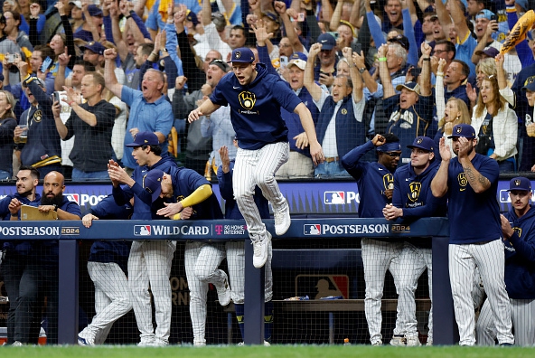 The Brewers celebrate their win over the Mets in Game Two of the 2024 NL Wild Card Series