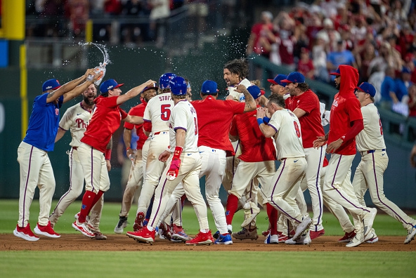 The Phillies celebrate a walk-off win over the Mets in Game 2 of the 2024 NLDS.