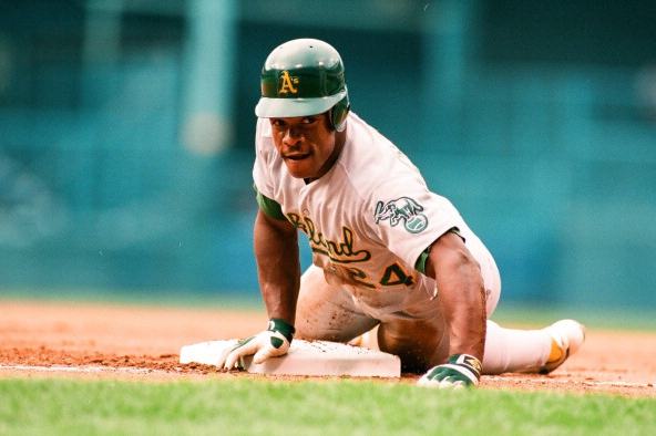 Rickey Henderson stealing third