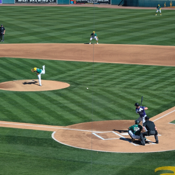 Jeffrey Springs pitching to Nolan Jones in the Athletics Rockies Cactus League game