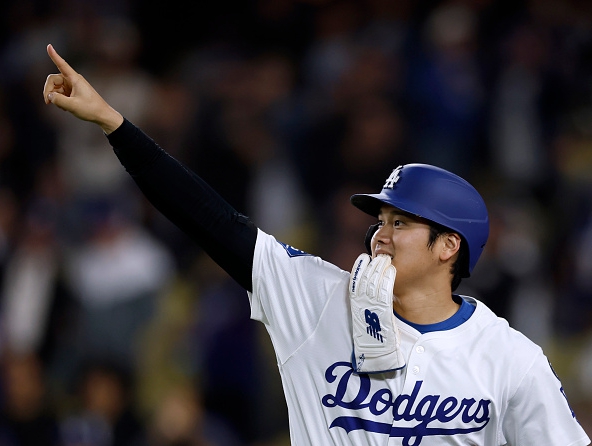 Shohei Ohtani of the Dodgers celebrating a home run against the Athletics