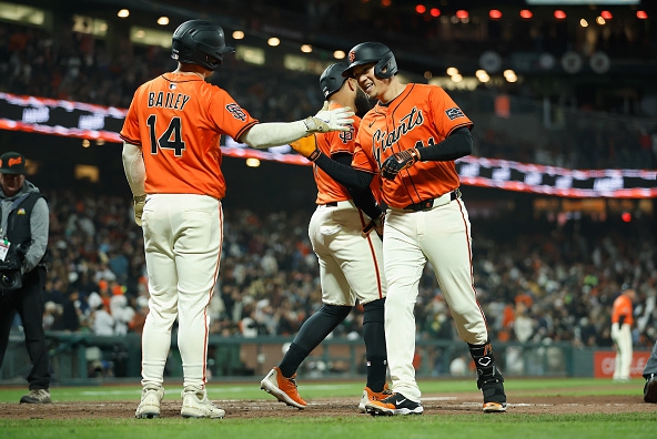 Wilmer Flores of the Giants celebrating a home run against the Athletics