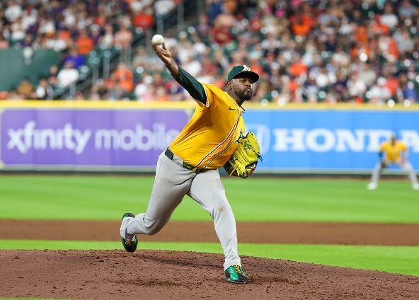 Luis Severino of the Athletics pitching to the Astros