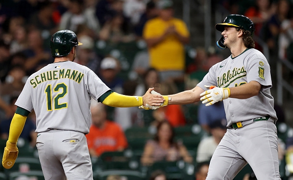 Nick Kurtz of the Athletics greeting Max Schuemann after his first of four home runs