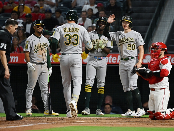 JJ Bleday celebrating a home run against the Angels with his Athletics teammates