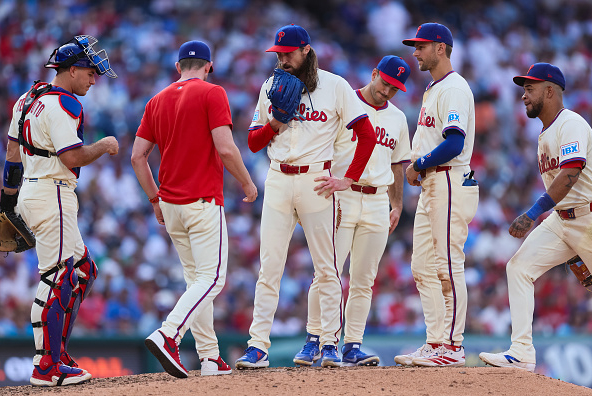 Matt Strahm of the Phillies bullpen reacts to a mound visit