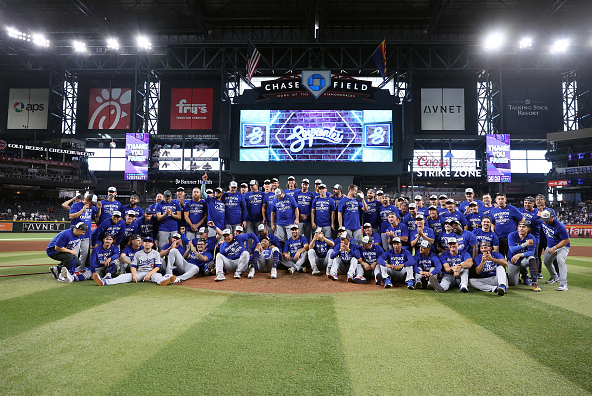 The Los Angeles Dodgers clinch the NL West Title for the 12th time in the past 13 years with a victory over the Arizona Diamondbacks.