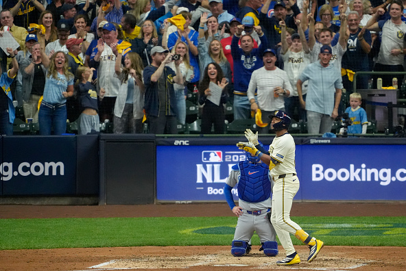 Jackson Chourio of the Brewers celebrates a home run against the Cubs in Game Two of the 2025 NLDS