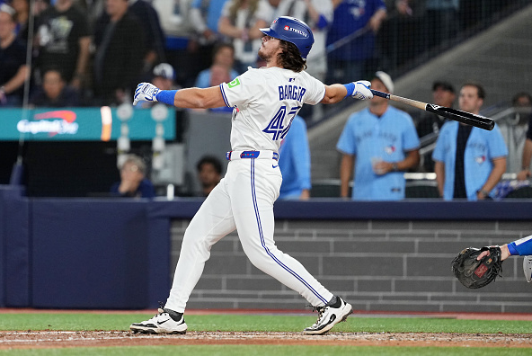 Addison Barger of the Blue Jays hitting a grand slam against the Dodgers in Game 1 of the 2025 World Series