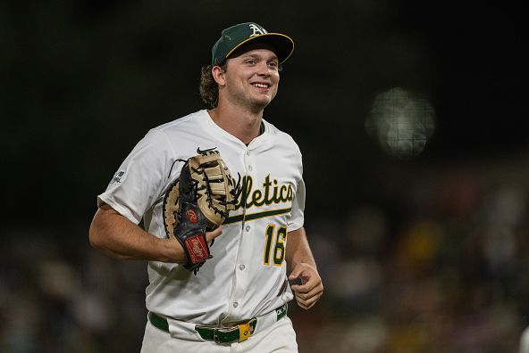 Nick Kurtz smiling as he trots off the field. The Athletics first baseman unanimously became the 2025 AL Rookie of the Year, he learned Monday night.