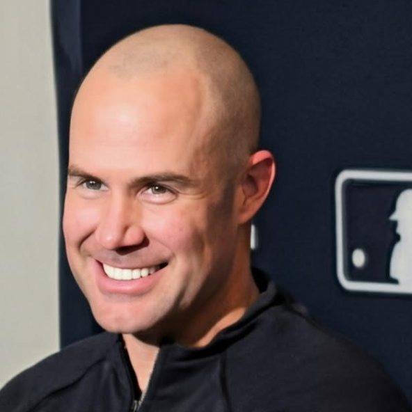 Skip Schumaker smiling at a question from a reporter