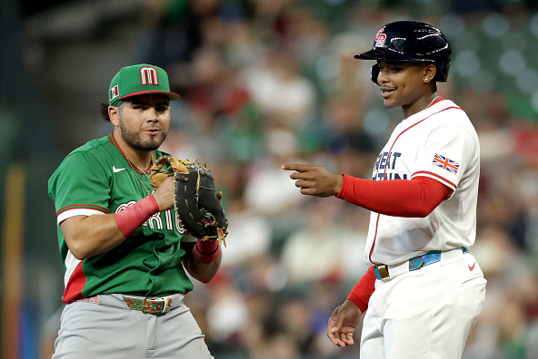 Players from Mexico and Great Britain during their Pool B game in the 2026 World Baseball Classic