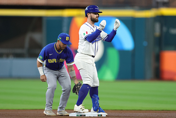 Jon Berti of Team Italy celebrating a big hit against Team Brazil
