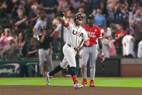 Kyle Schwarber of the United States running out a home run against Great Britain in the World Baseball Classic