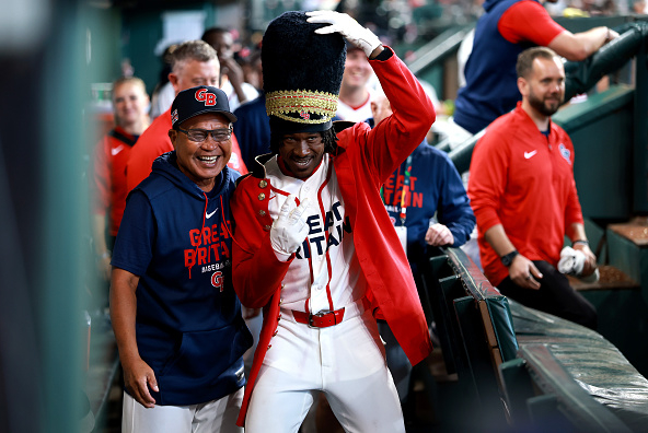 Ian Lewis Jr. of Team Great Britain celebrating a home run against Team Brazil