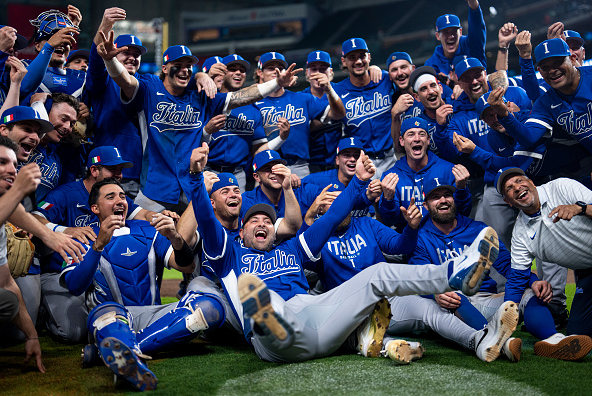 Team Italy celebrating after defeating Team Mexico to win Pool B of the 2026 World Baseball Classic.