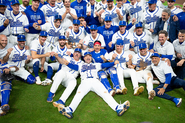 Italy celebrating on the field after beating Puerto Rico in the 2026 WBC quarterfinals