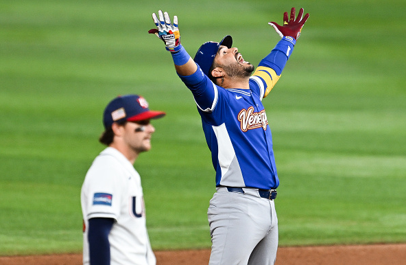 Eugenio Suarez of Venezuela celebrating the go-ahead double against the United States in the 2026 World Baseball Classic final