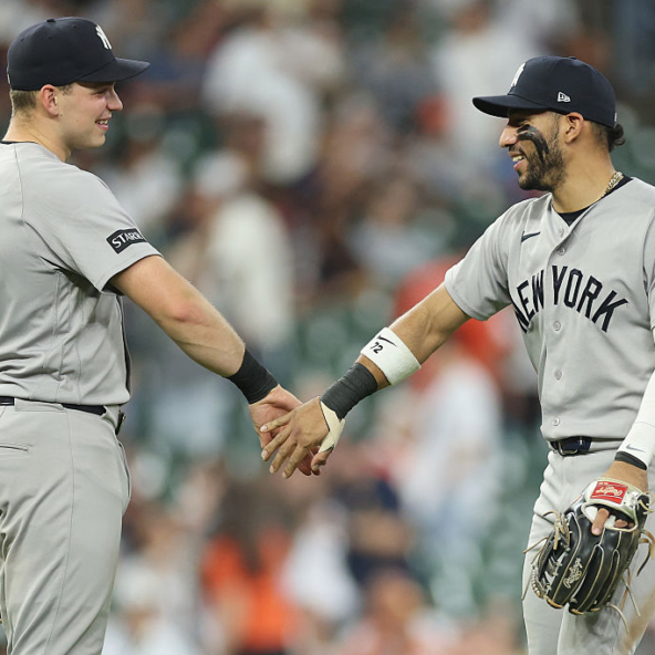 Two Yankees celebrating a win over the Astros