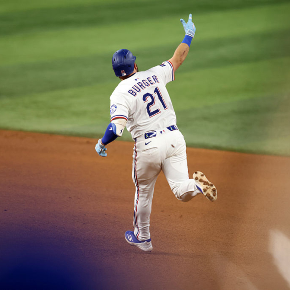 Jake Burger helped the Rangers pull away after Peter Lambert and Nathan Eovaldi traded scoreless innings early.