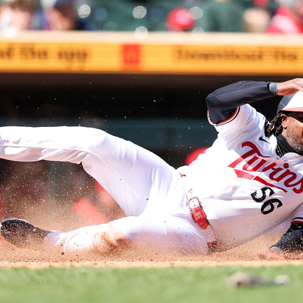 Josh Bell recorded two home runs and four RBI as the Minnesota Twins defeated the Houston Astros 6-3 following a lengthy rain delay.
