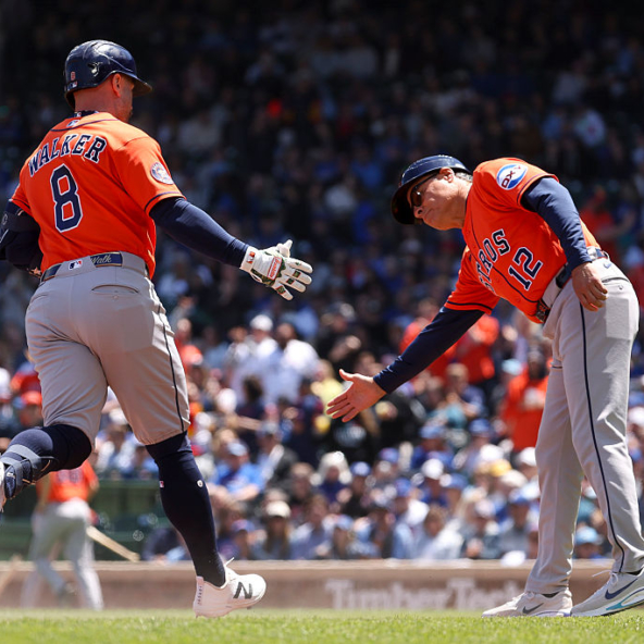 Christian Walker of the Astros celebrating a homer against the Cubs